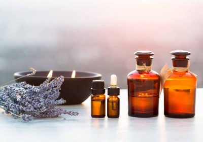 essential-oil-bottles-sunset-with-a-candle